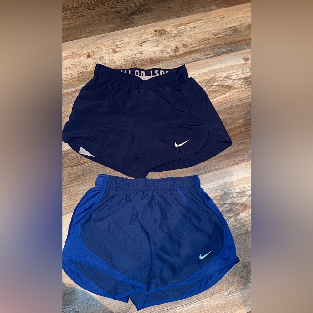 Two pairs of nike shorts xs. hardly worn